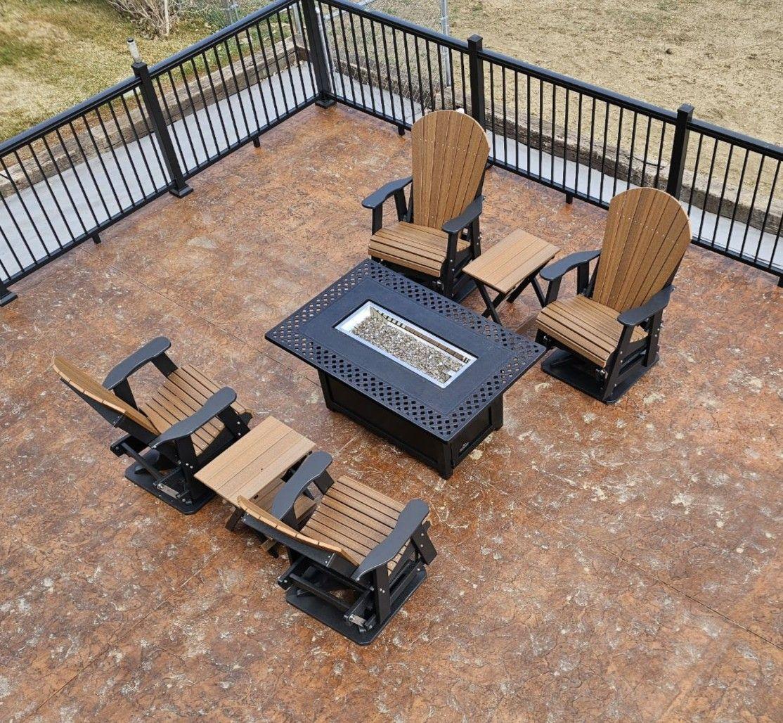 Overhead view of a deck with Adirondack chairs around a rectangular fire table